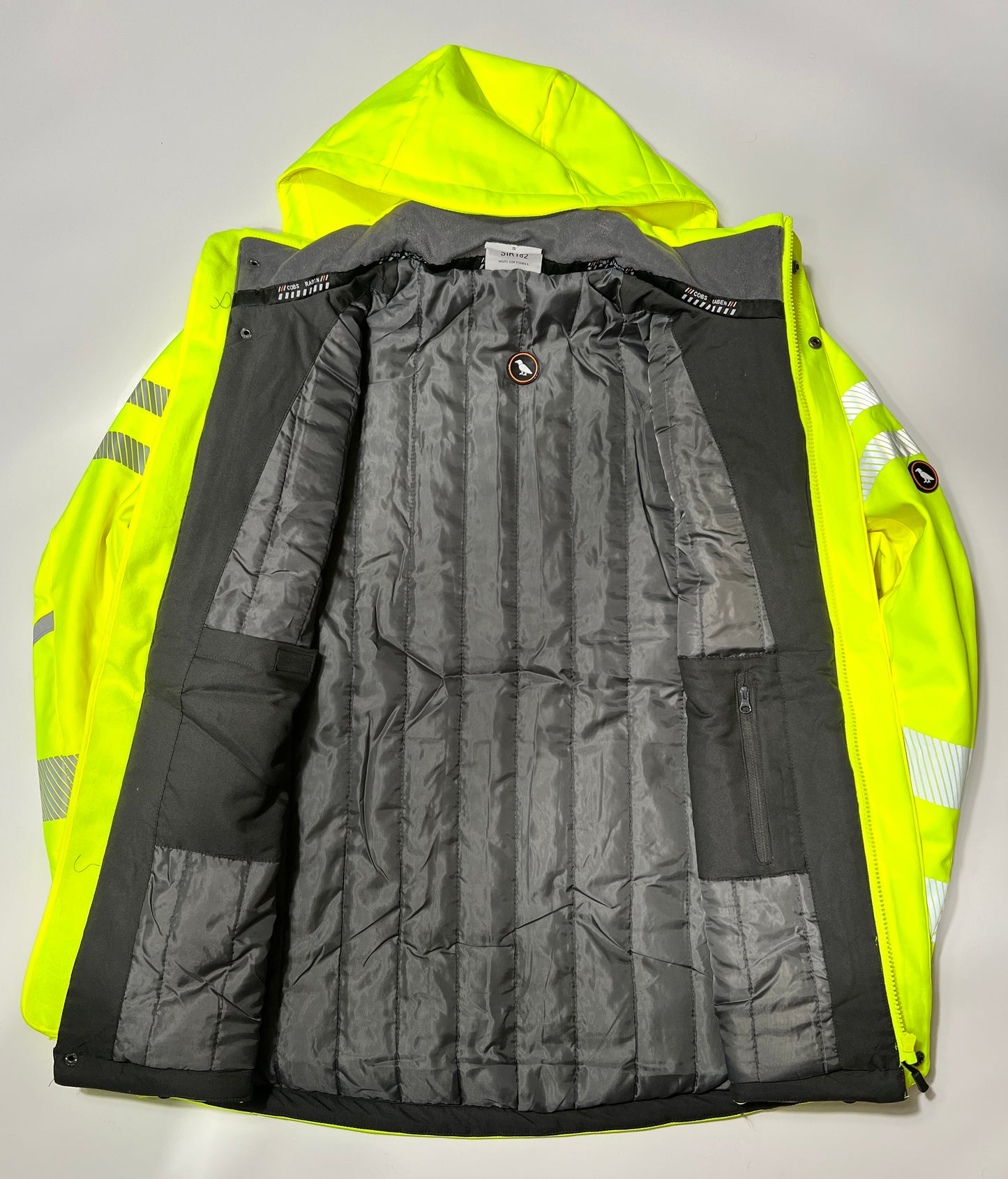 Innenseite der Softshelljacke in warngelb mit Steppfutter