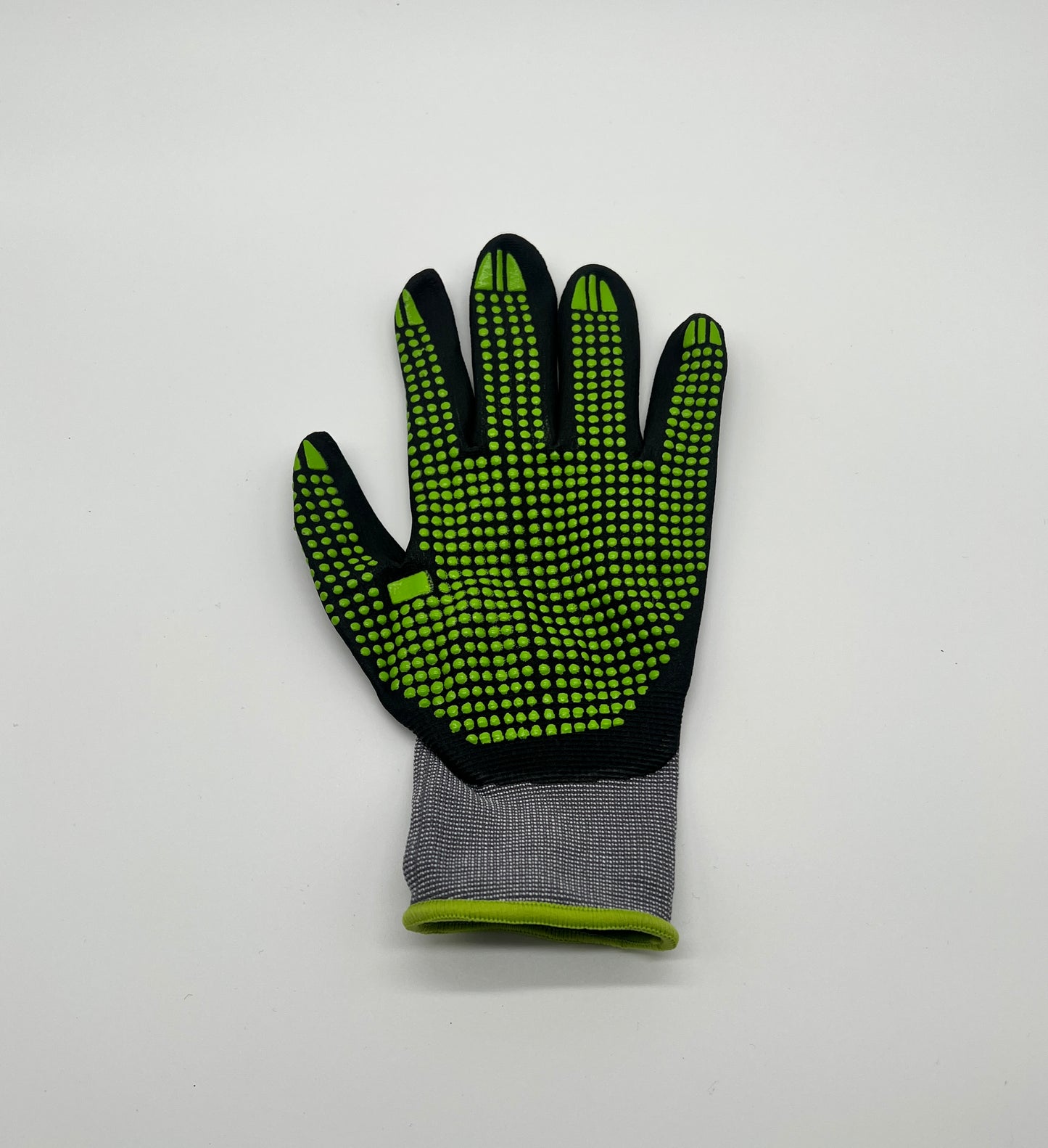 Super flexibler Handschuh in schwarz/grauer Farbe mit grünen Noppen